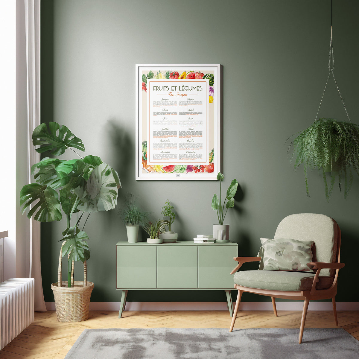 Affiche Fruits et Légumes de Saison encadrée et accrochée dans un salon vert sauge avec monsteras et fauteuil vintage