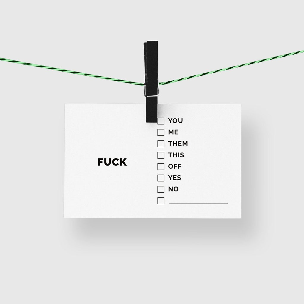 Cartes de visite humour FUCK suspendues à une corde à linge